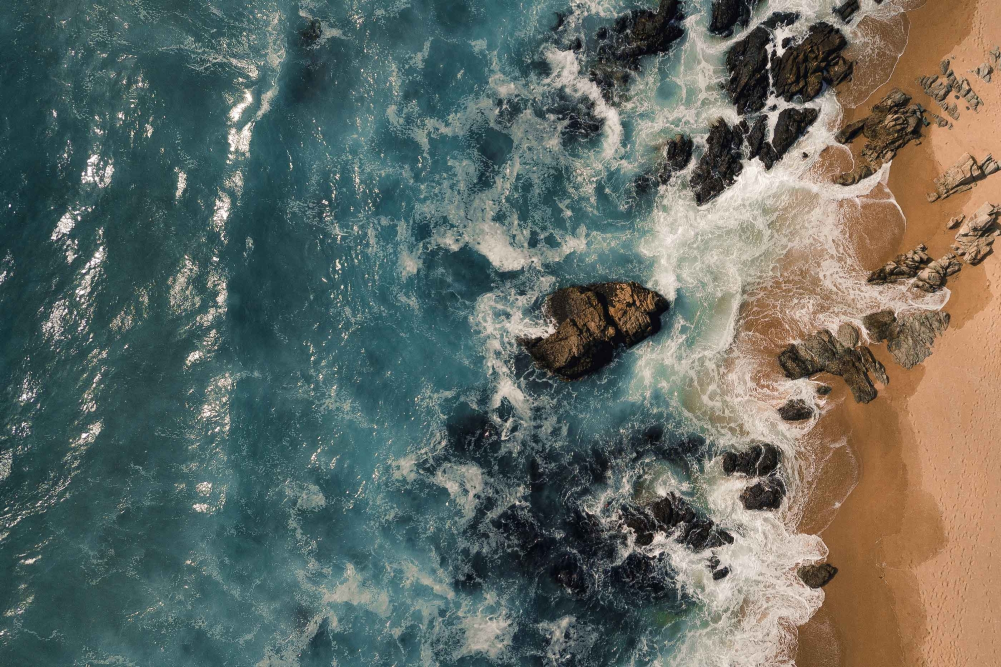 An aerial view of a rocky coastline